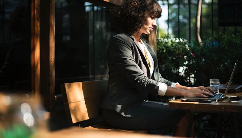 Slender girl in business suit